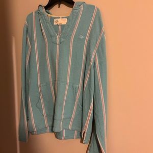 OP blue hoodie with pink and white stripes.